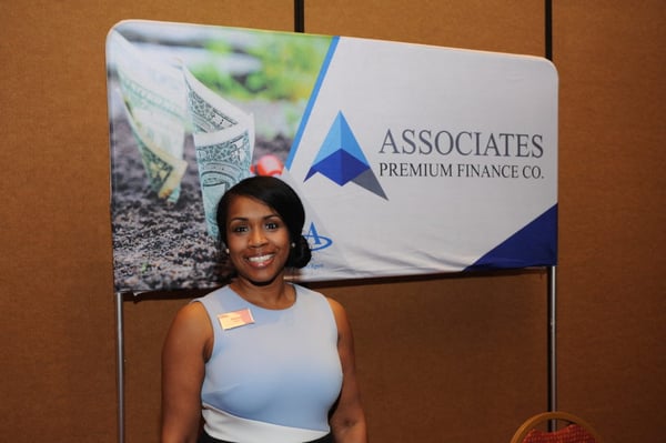 Felicia Taylor, Director of APFCO, at the tradeshow booth