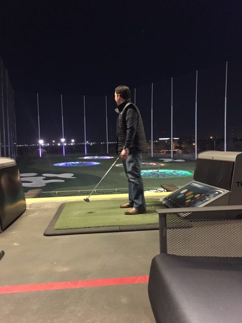 man playing top golf